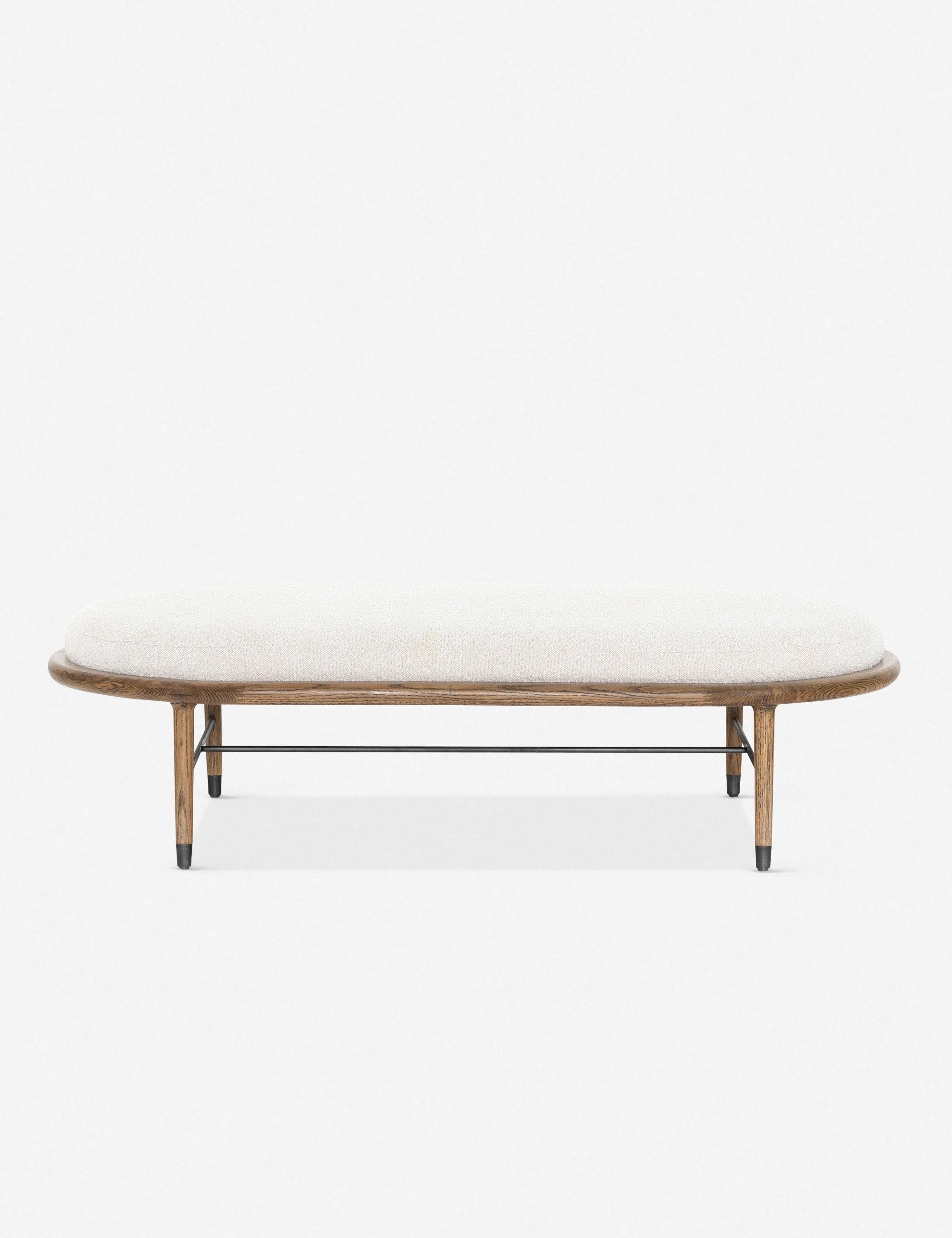 Banc - Ce banc allie subtilement style et fonctionnalité, avec son assise ovale capitonnée suffisamment spacieuse pour offrir une surface d'appoint lorsque