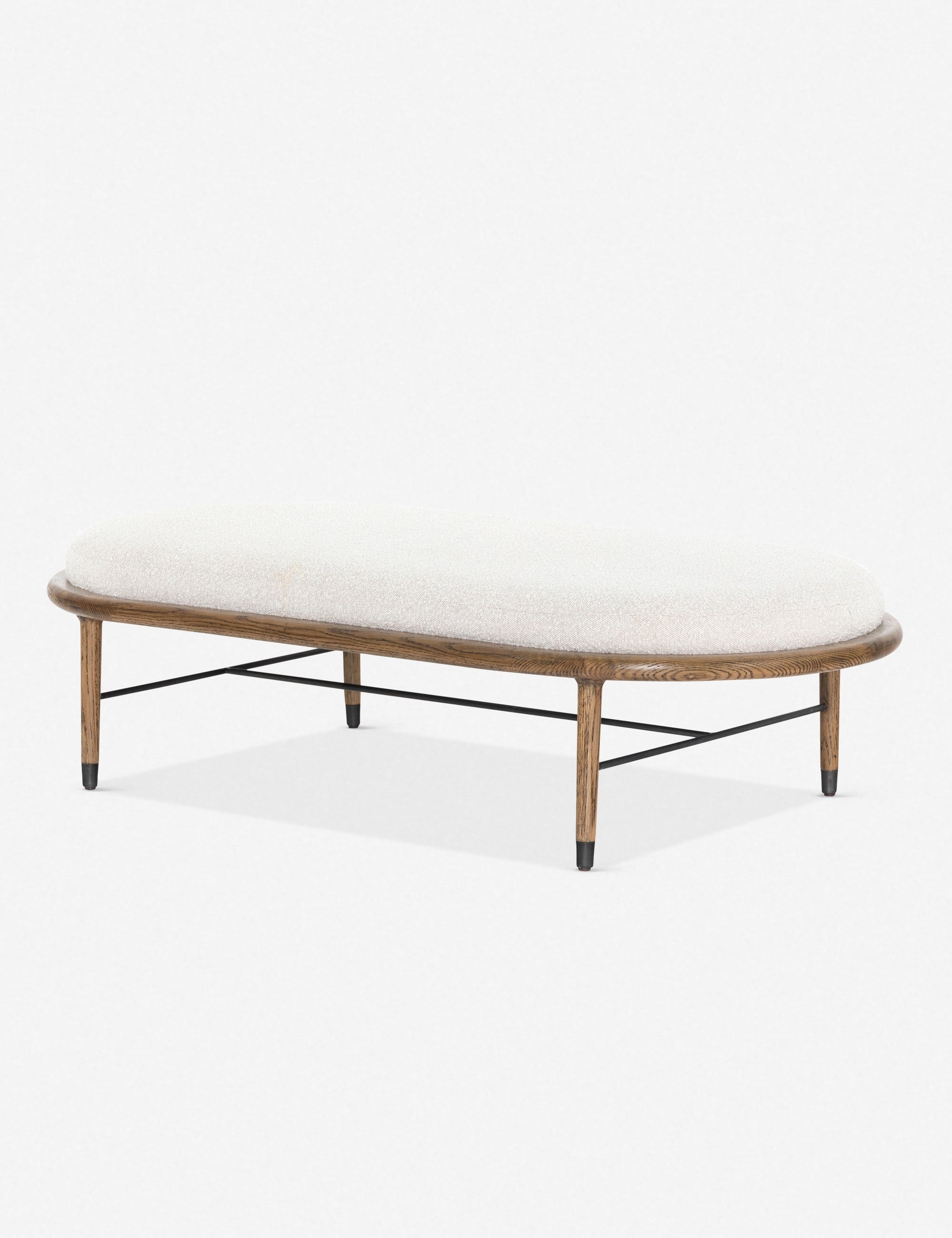 Banc - Ce banc allie subtilement style et fonctionnalité, avec son assise ovale capitonnée suffisamment spacieuse pour offrir une surface d'appoint lorsque