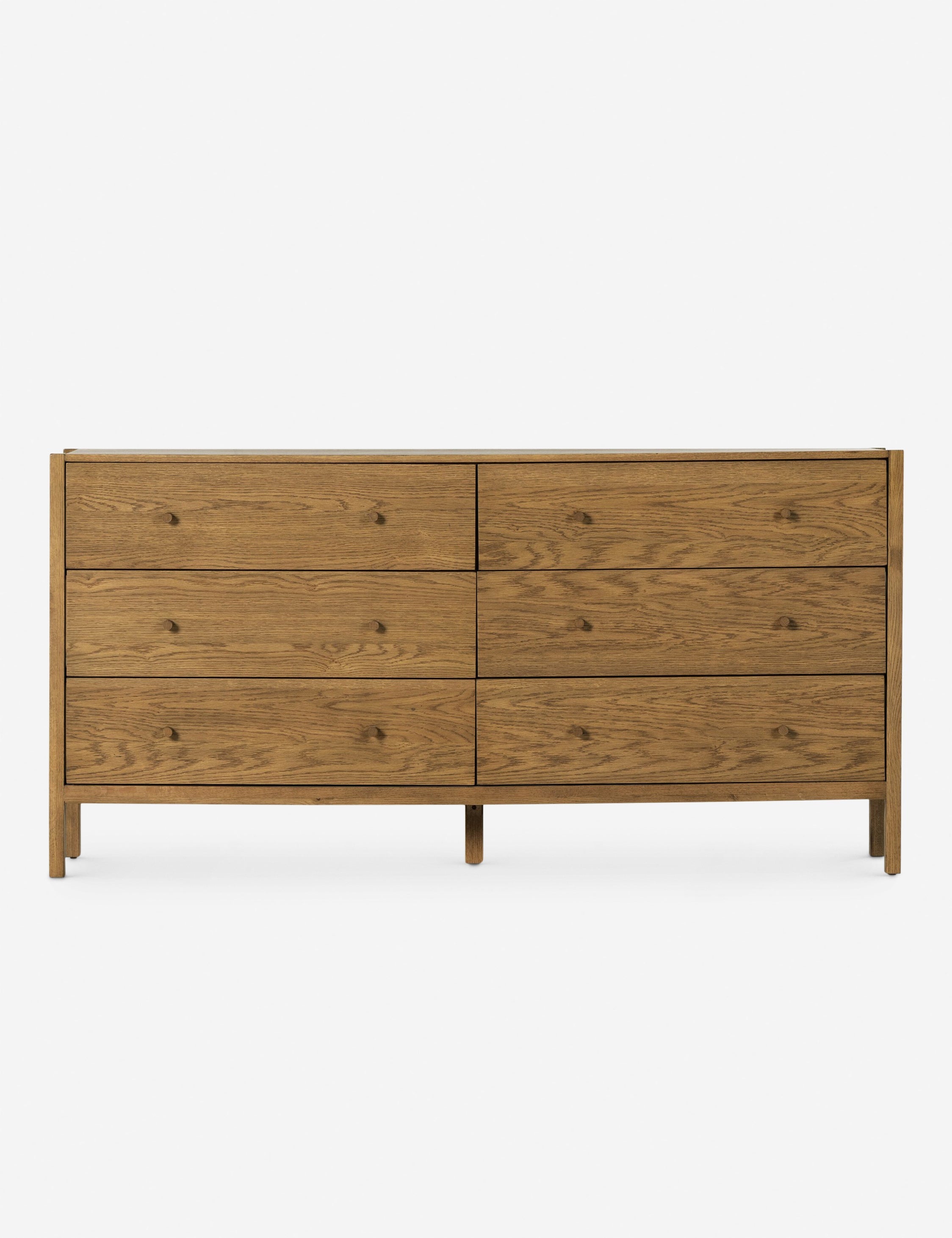 Commode - Avec son cadre apparent et ses lignes minimalistes, cette commode offre une version modernisée du style du milieu du siècle dernier