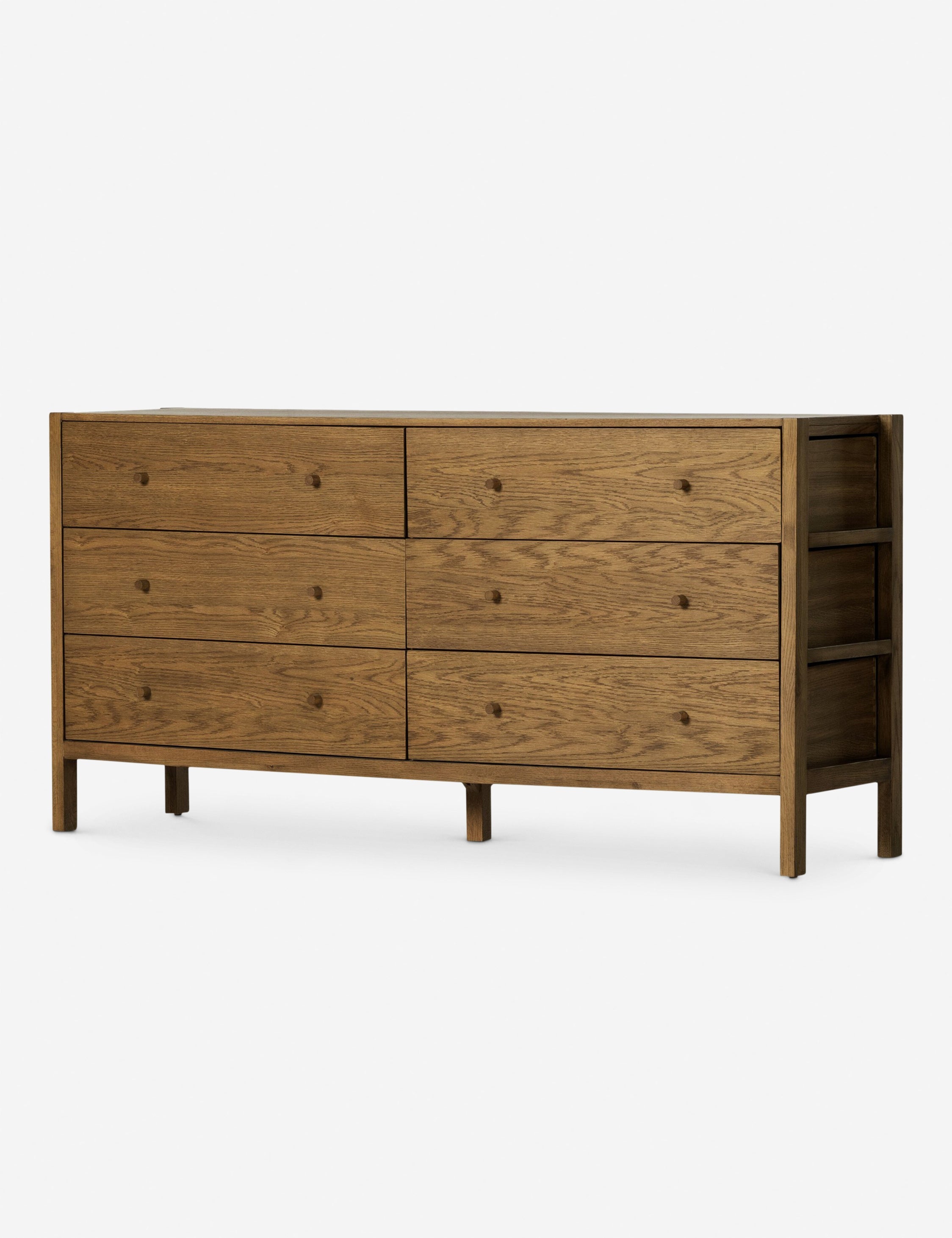 Commode - Avec son cadre apparent et ses lignes minimalistes, cette commode offre une version modernisée du style du milieu du siècle dernier