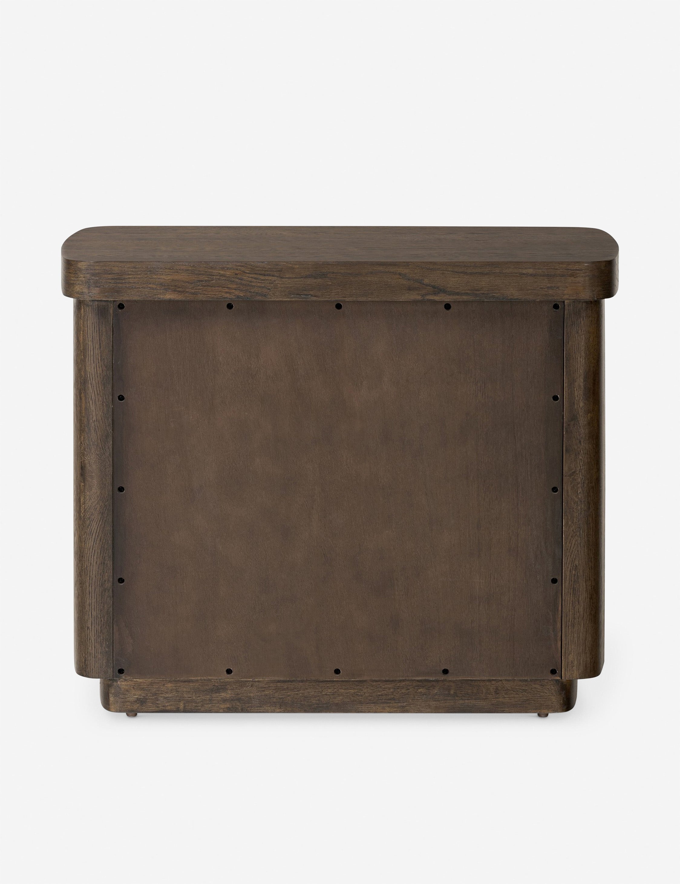 Table de chevet - Ancrée dans une simplicité sculpturale, la table de chevet offre une présence audacieuse avec une touche moderne