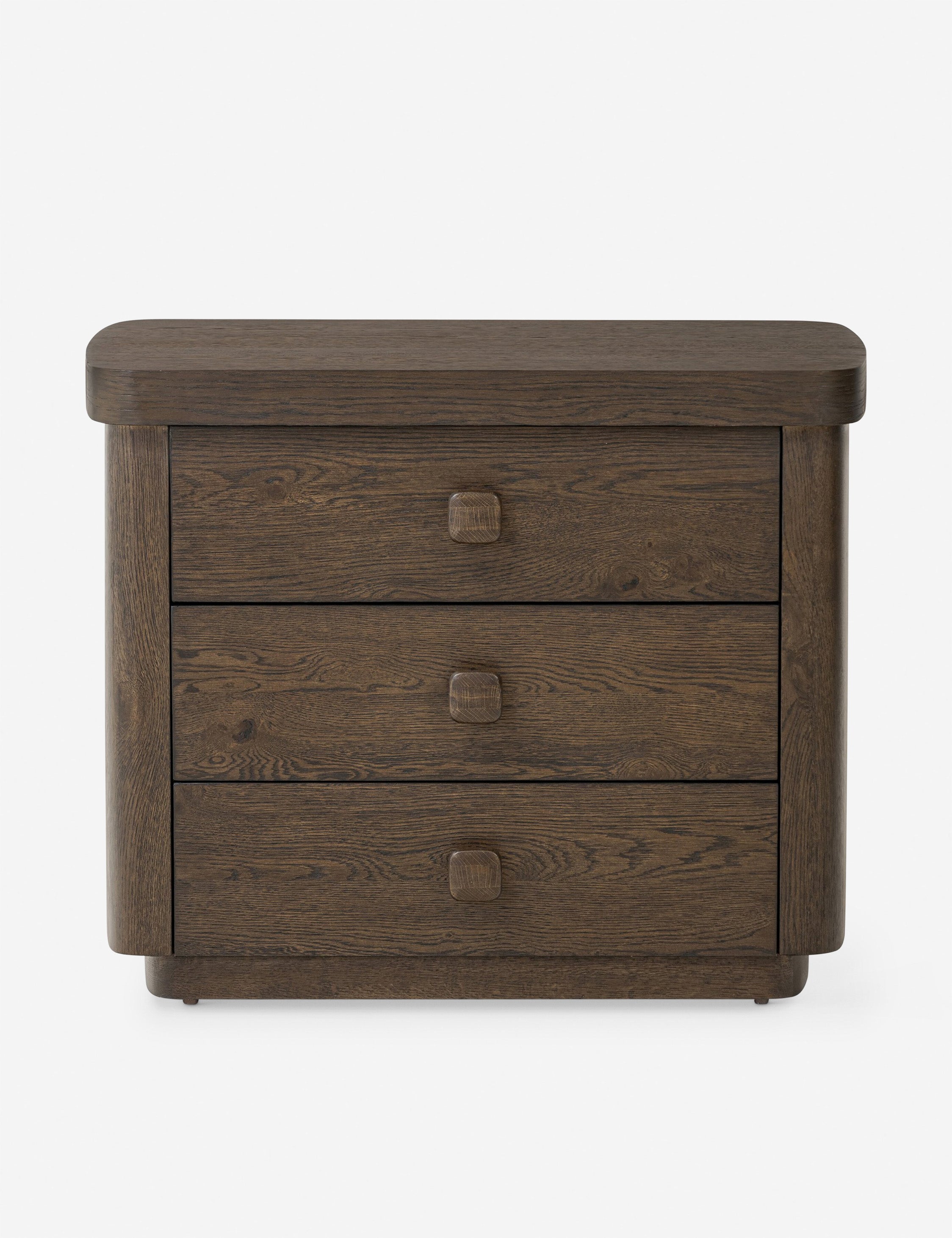 Table de chevet - Ancrée dans une simplicité sculpturale, la table de chevet offre une présence audacieuse avec une touche moderne