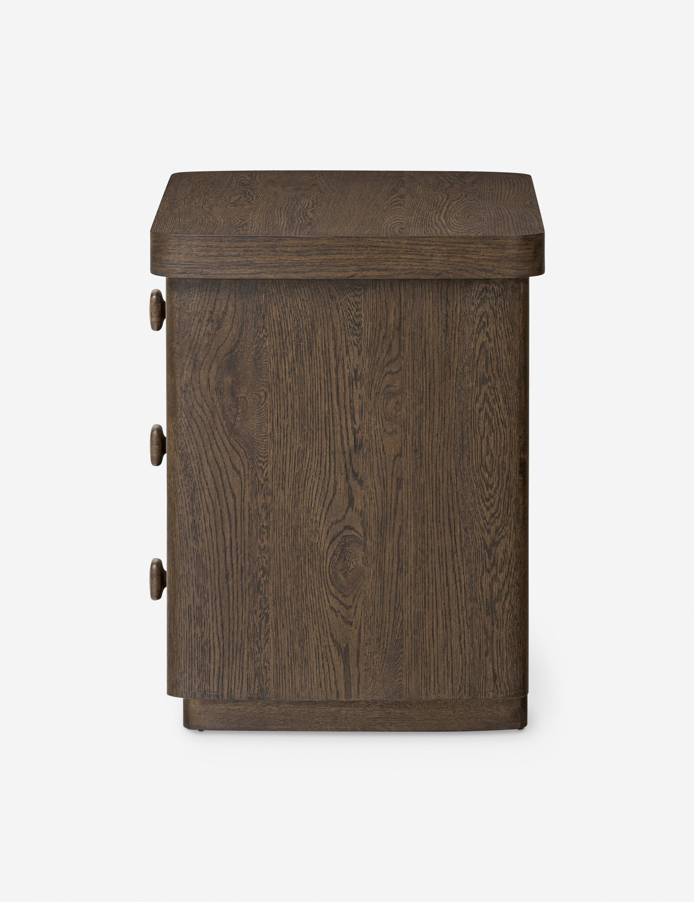 Table de chevet - Ancrée dans une simplicité sculpturale, la table de chevet offre une présence audacieuse avec une touche moderne