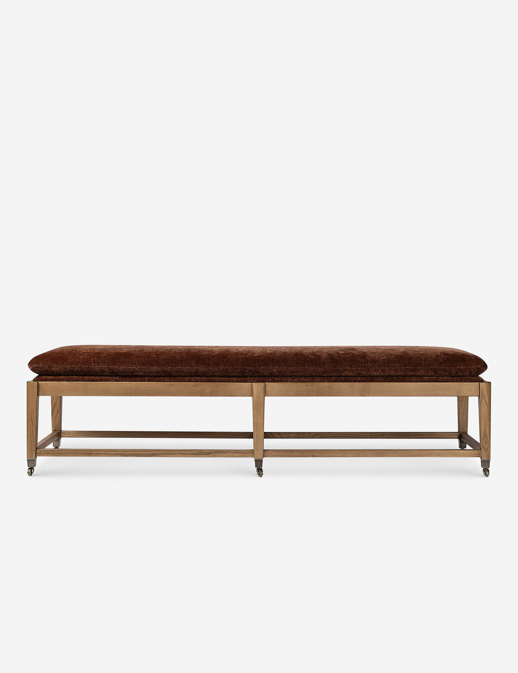 Banc - Ce banc présente un design rétro, ses six pieds étant munis de roulettes en laiton.