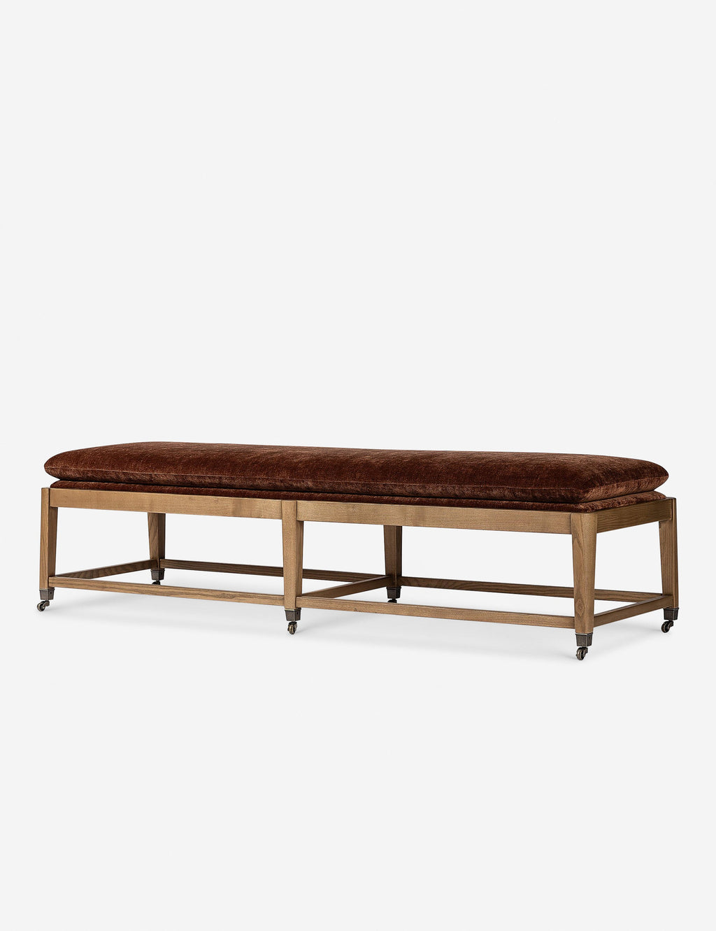 Banc - Ce banc présente un design rétro, ses six pieds étant munis de roulettes en laiton.