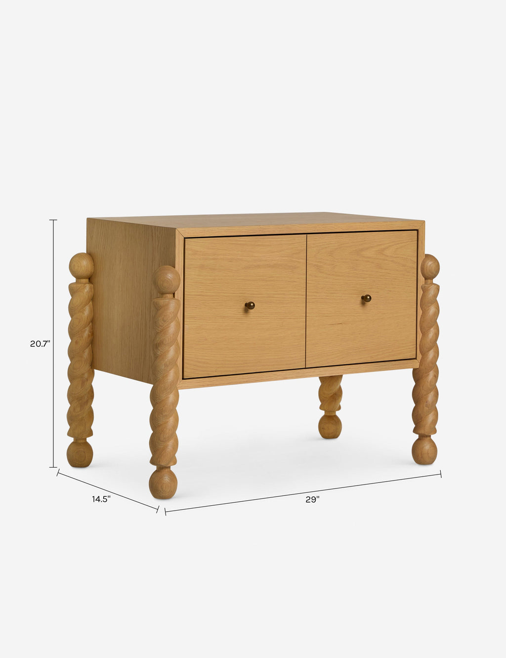 Table de chevet - Alliant avec raffinement formes et lignes, la table de chevet présente des pieds tournés sculpturaux qui encadrent une structure aux lignes épurées