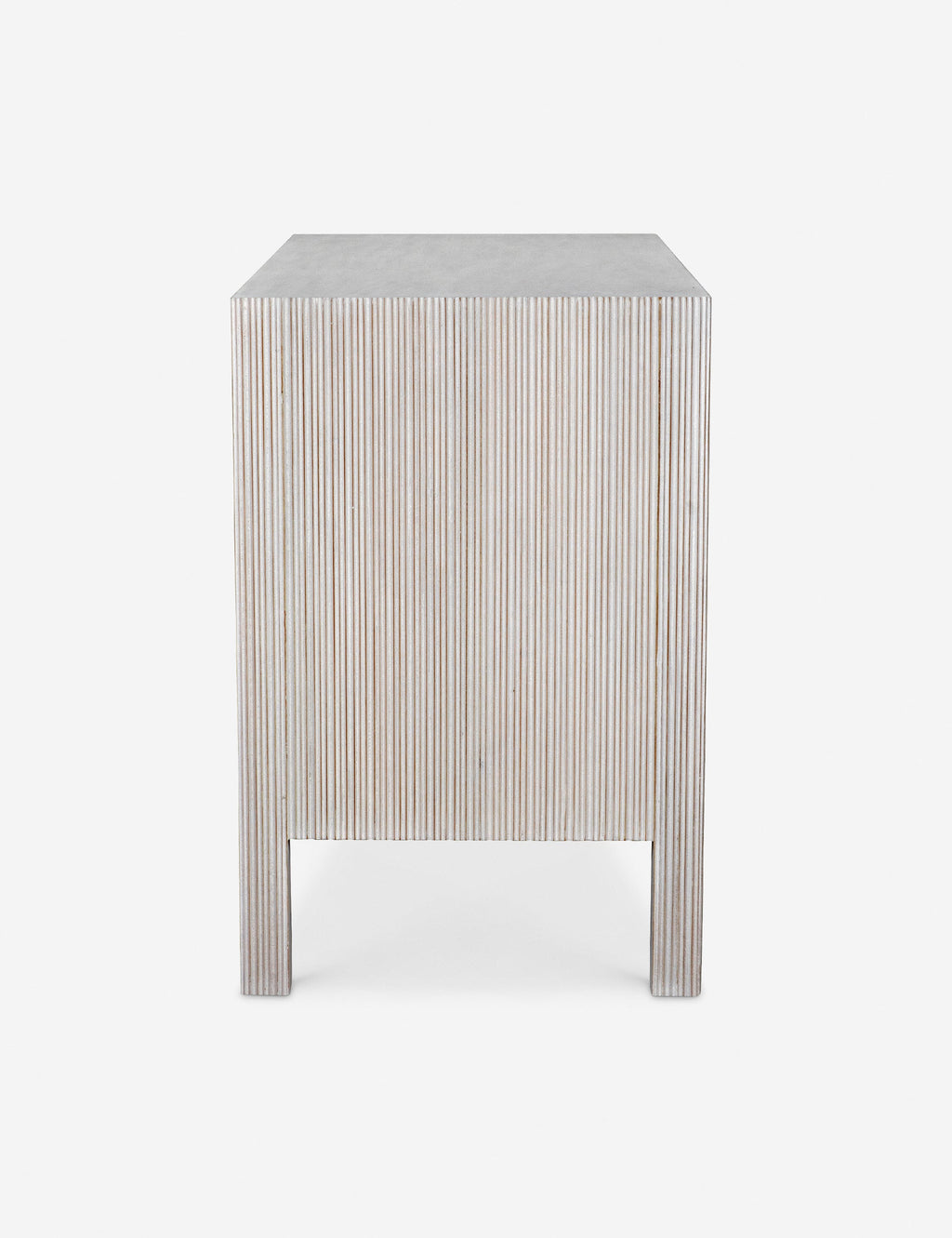 Commode à 6 tiroirs - Nous aimons la juxtaposition d'une silhouette épurée et de détails texturés cannelés dans la commode Bellinger.