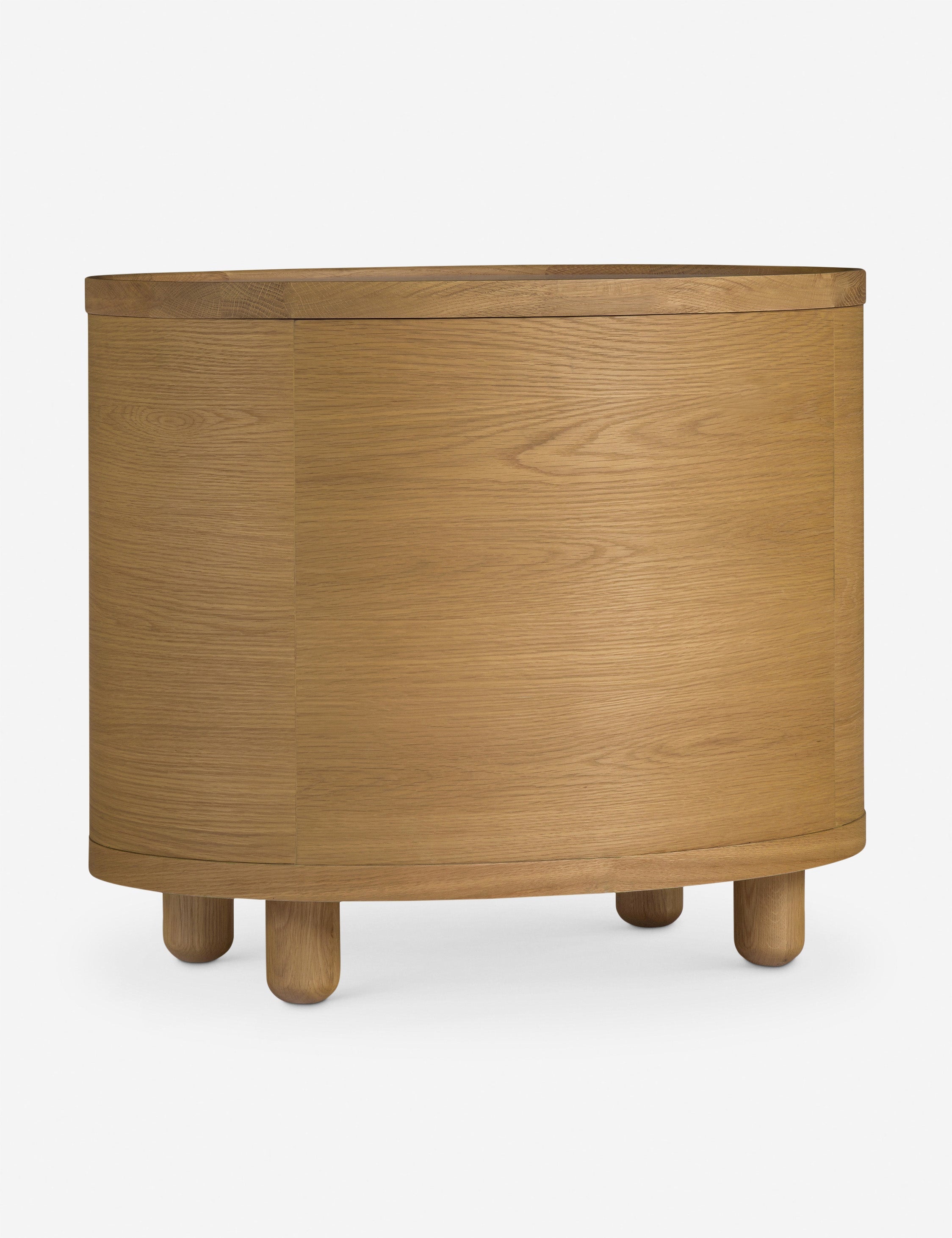 Table d'appoint - La table d'appoint Laguna présente un boîtier ovale aux lignes épurées reposant sur des pieds boules pour un impact discret en chêne