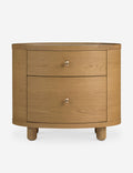 Table d'appoint - La table d'appoint Laguna présente un boîtier ovale aux lignes épurées reposant sur des pieds boules pour un impact discret en chêne