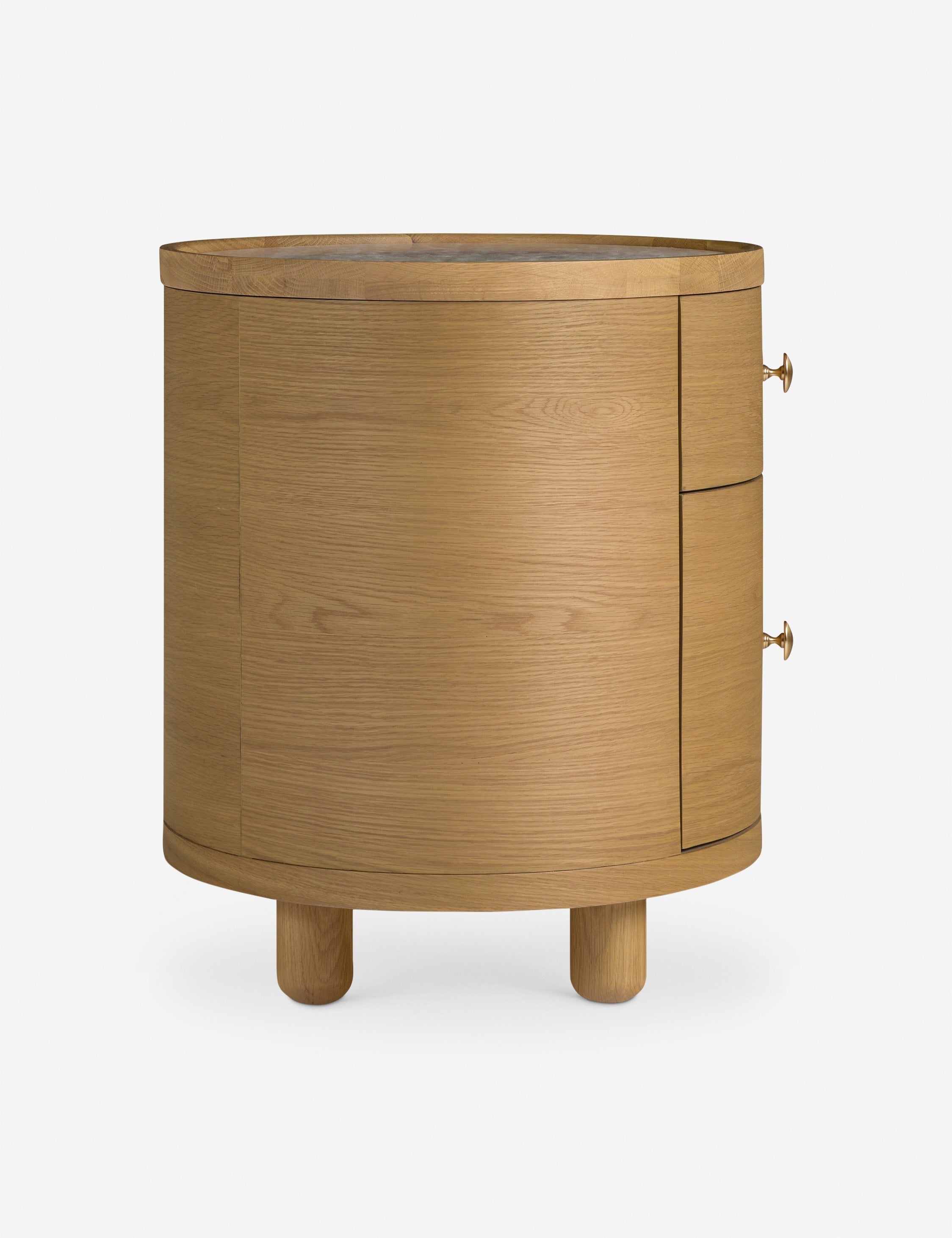 Table d'appoint - La table d'appoint Laguna présente un boîtier ovale aux lignes épurées reposant sur des pieds boules pour un impact discret en chêne