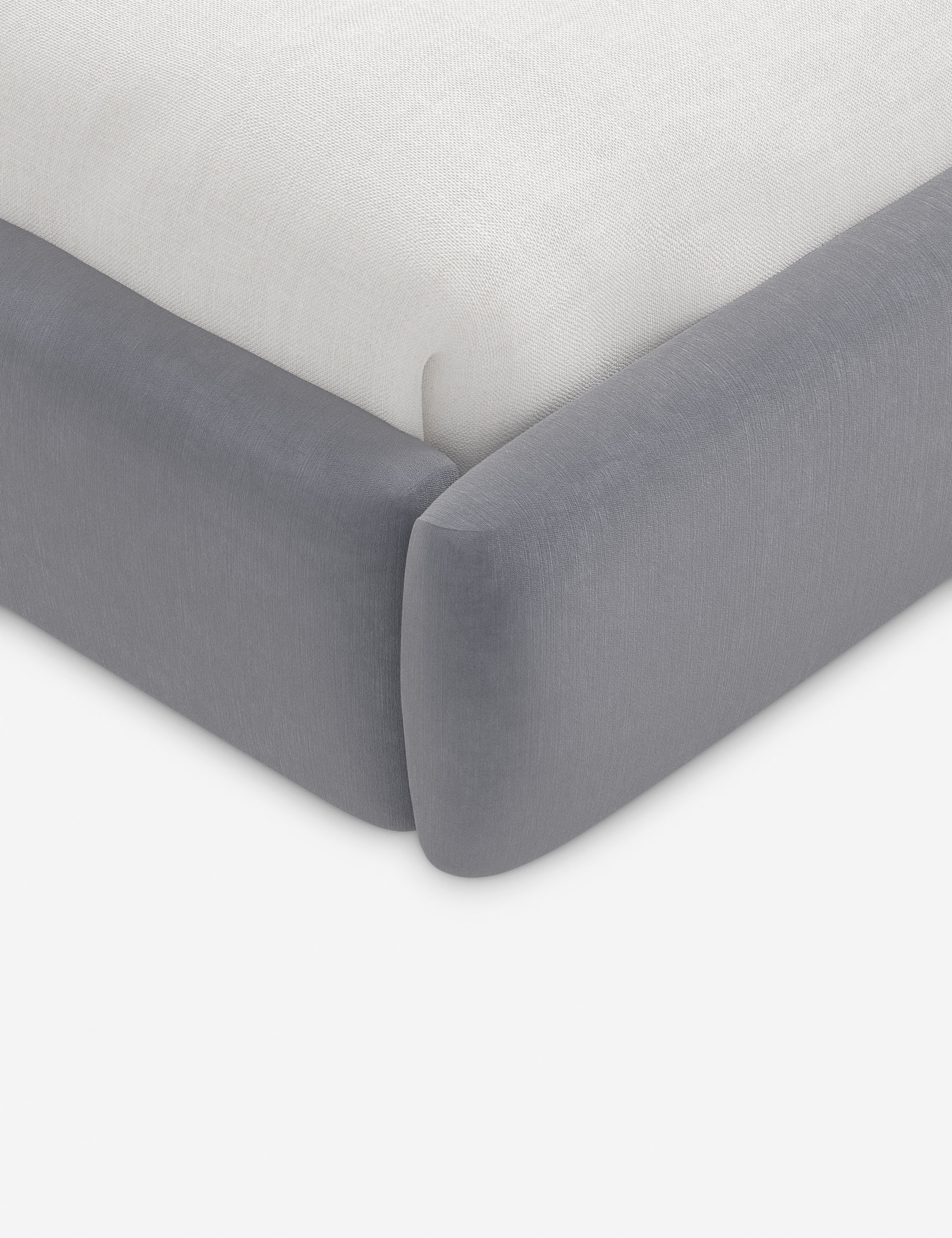 Lit plateforme haut - Un design épuré et une tête de lit arrondie confèrent une touche de douceur à ce cadre de lit tapissé