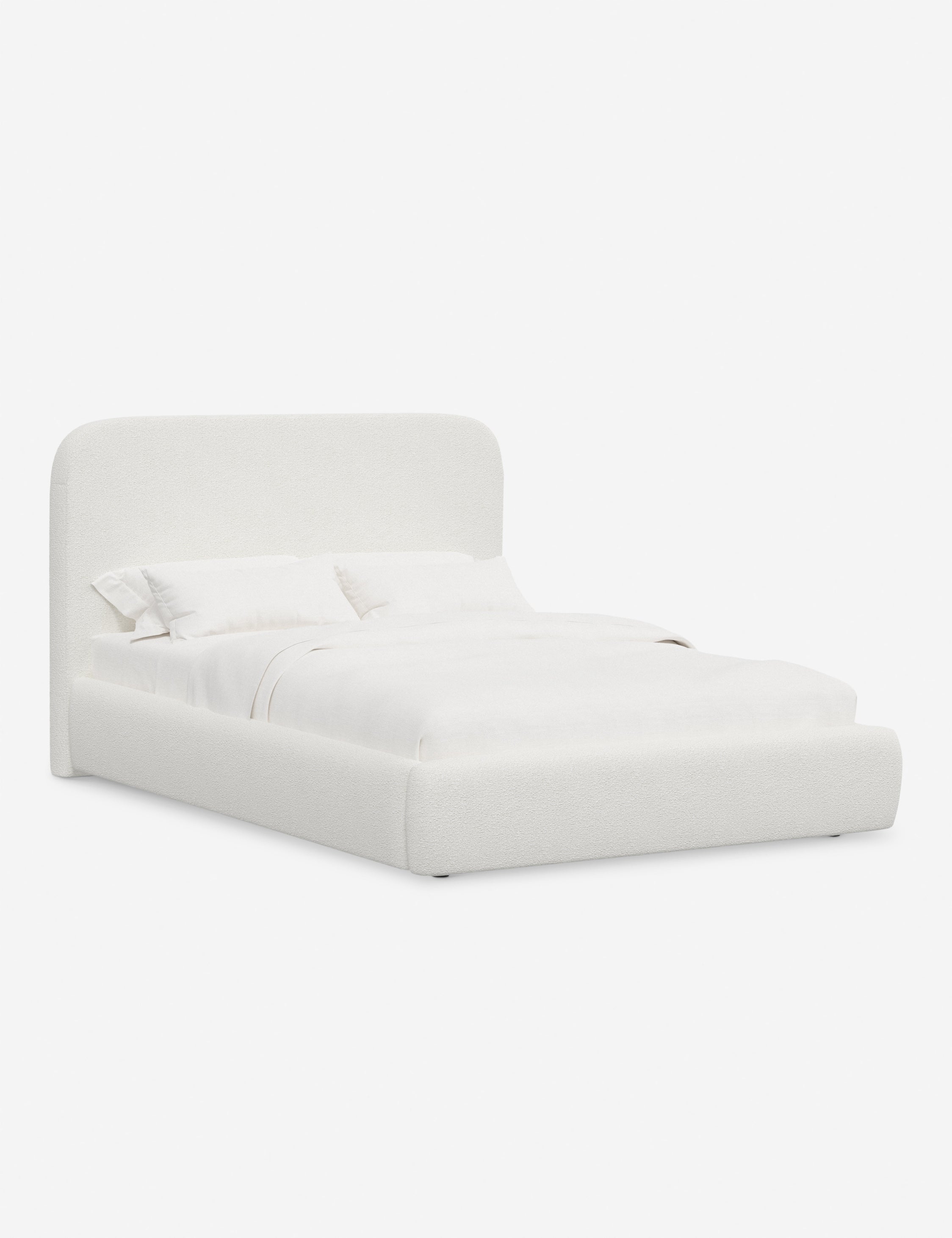 Lit plateforme haut - Un design épuré et une tête de lit arrondie confèrent une touche de douceur à ce cadre de lit tapissé