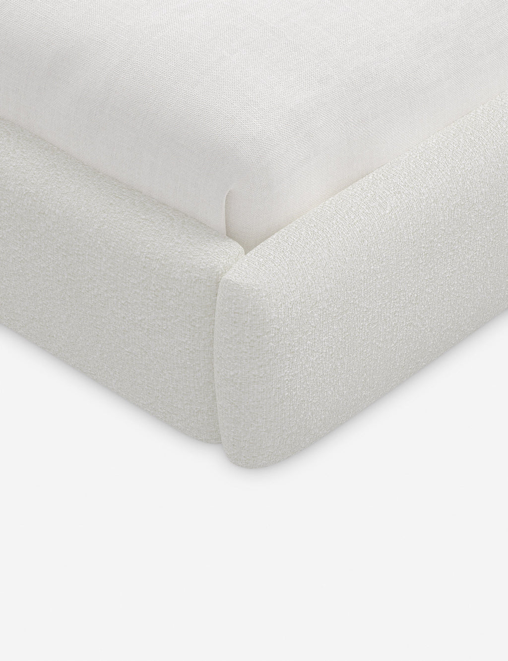 Lit plateforme haut - Un design épuré et une tête de lit arrondie confèrent une touche de douceur à ce cadre de lit tapissé