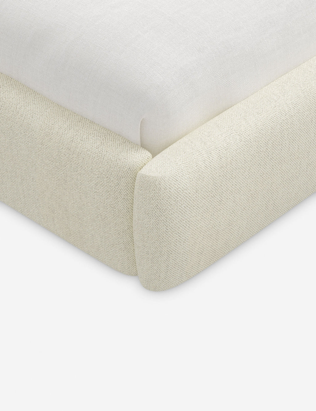 Lit plateforme haut - Un design épuré et une tête de lit arrondie confèrent une touche de douceur à ce cadre de lit tapissé