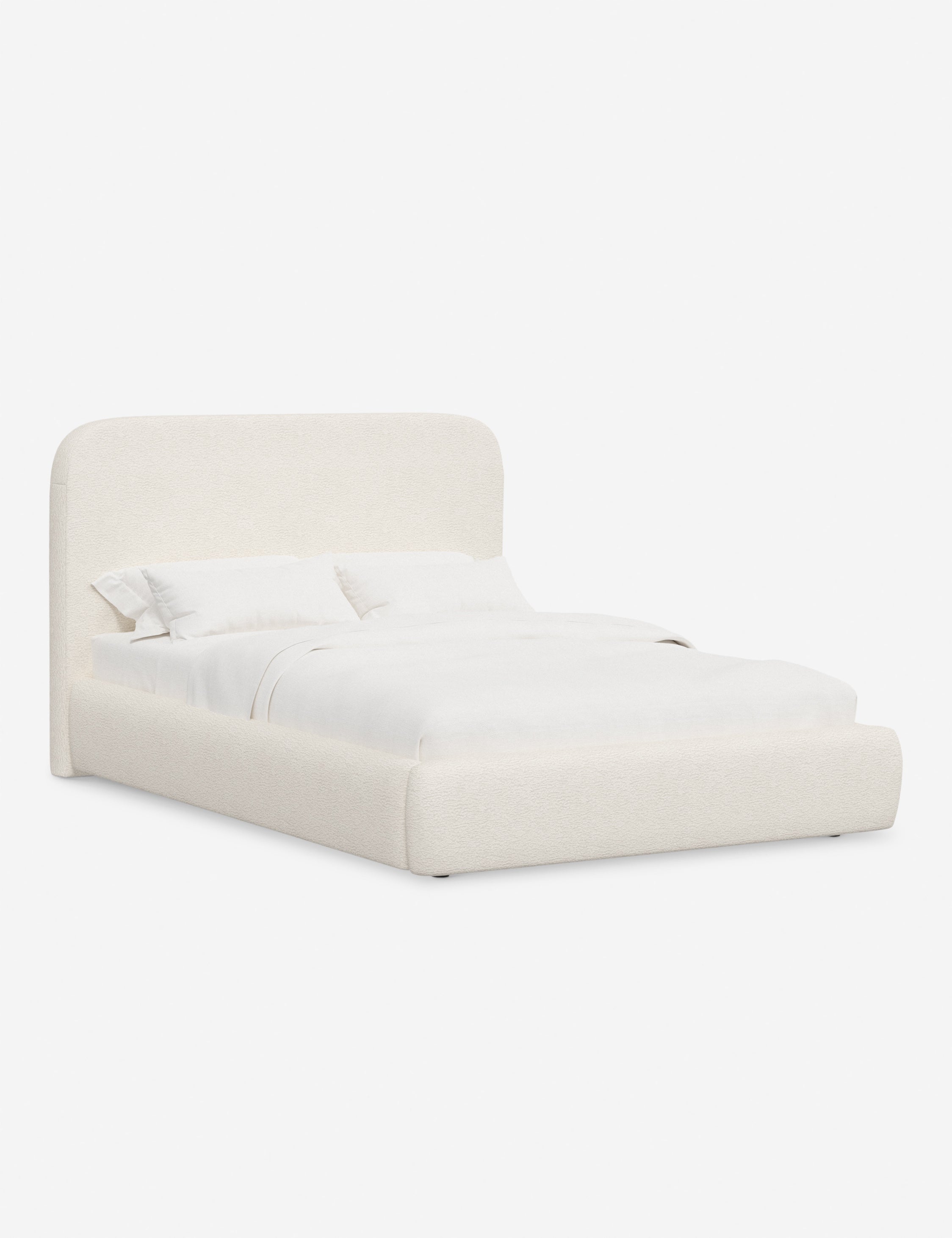 Lit plateforme haut - Un design épuré et une tête de lit arrondie confèrent une touche de douceur à ce cadre de lit tapissé