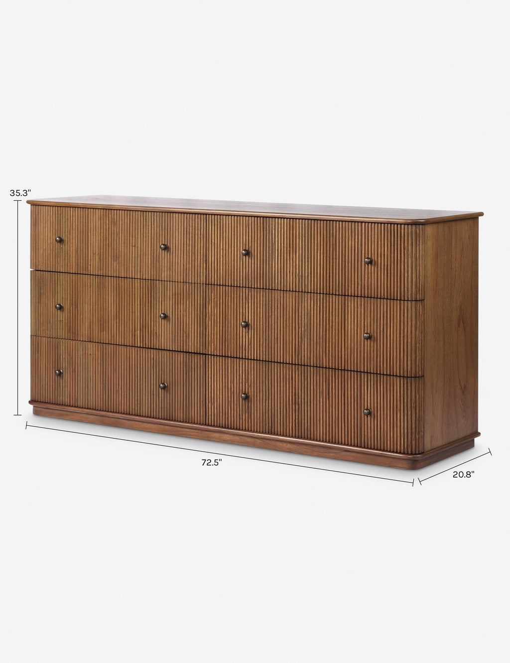 Commode Large - La commode offre une sophistication accrue grâce à ses détails cannelés et à sa base en plinthe