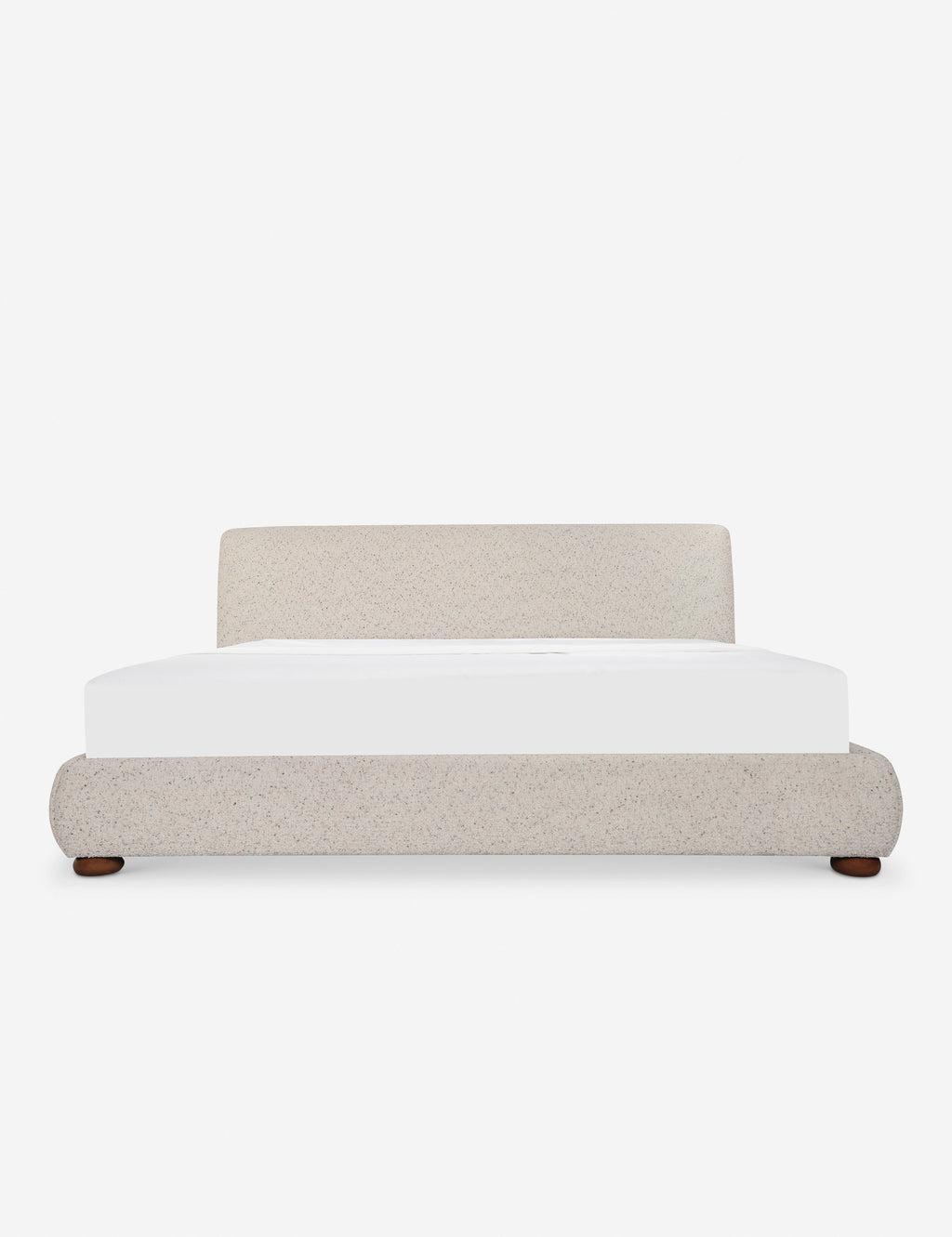 Lit - Le lit offre un impact doux avec une tête de lit délicatement arrondie et des pieds ludiques en forme de bun