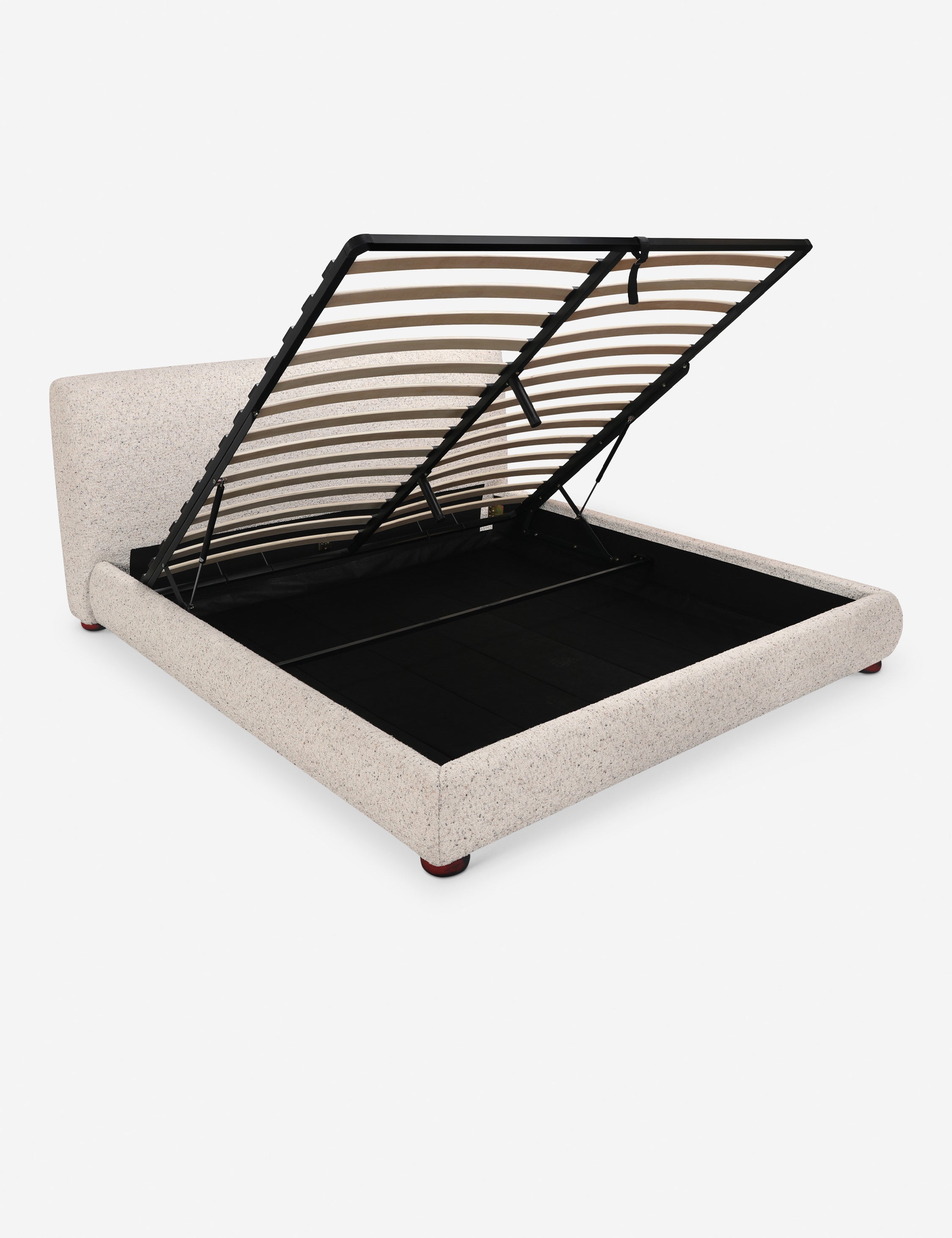 Lit - Le lit offre un impact doux avec une tête de lit délicatement arrondie et des pieds ludiques en forme de bun