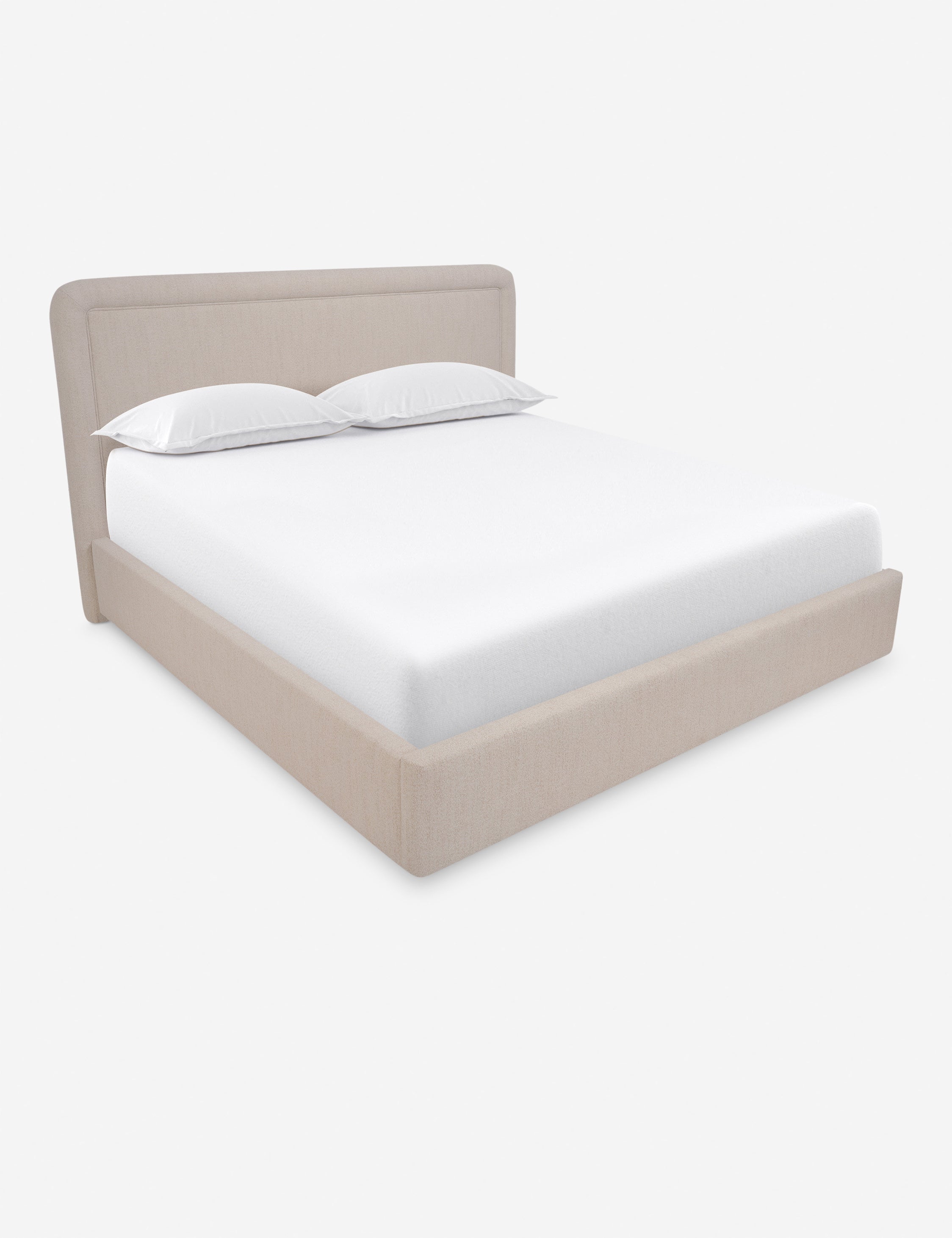 Lit - Le lit associe un cadre aux courbes douces à des passepoils pour un look épuré et sophistiqué