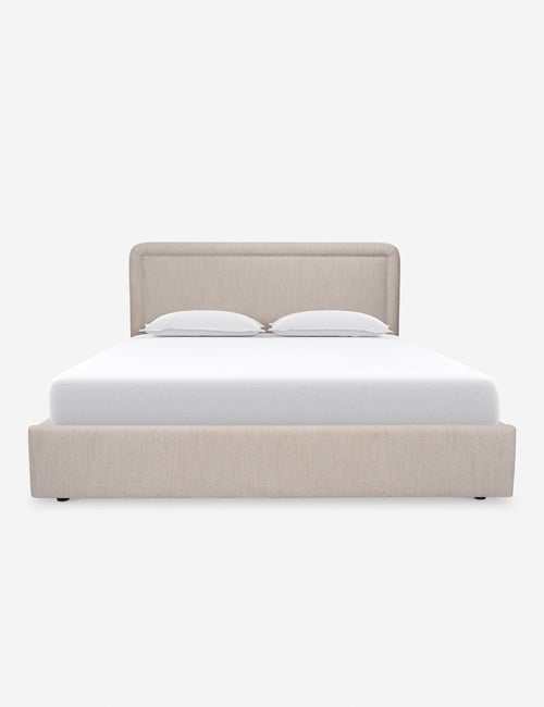Lit - Le lit associe un cadre aux courbes douces à des passepoils pour un look épuré et sophistiqué