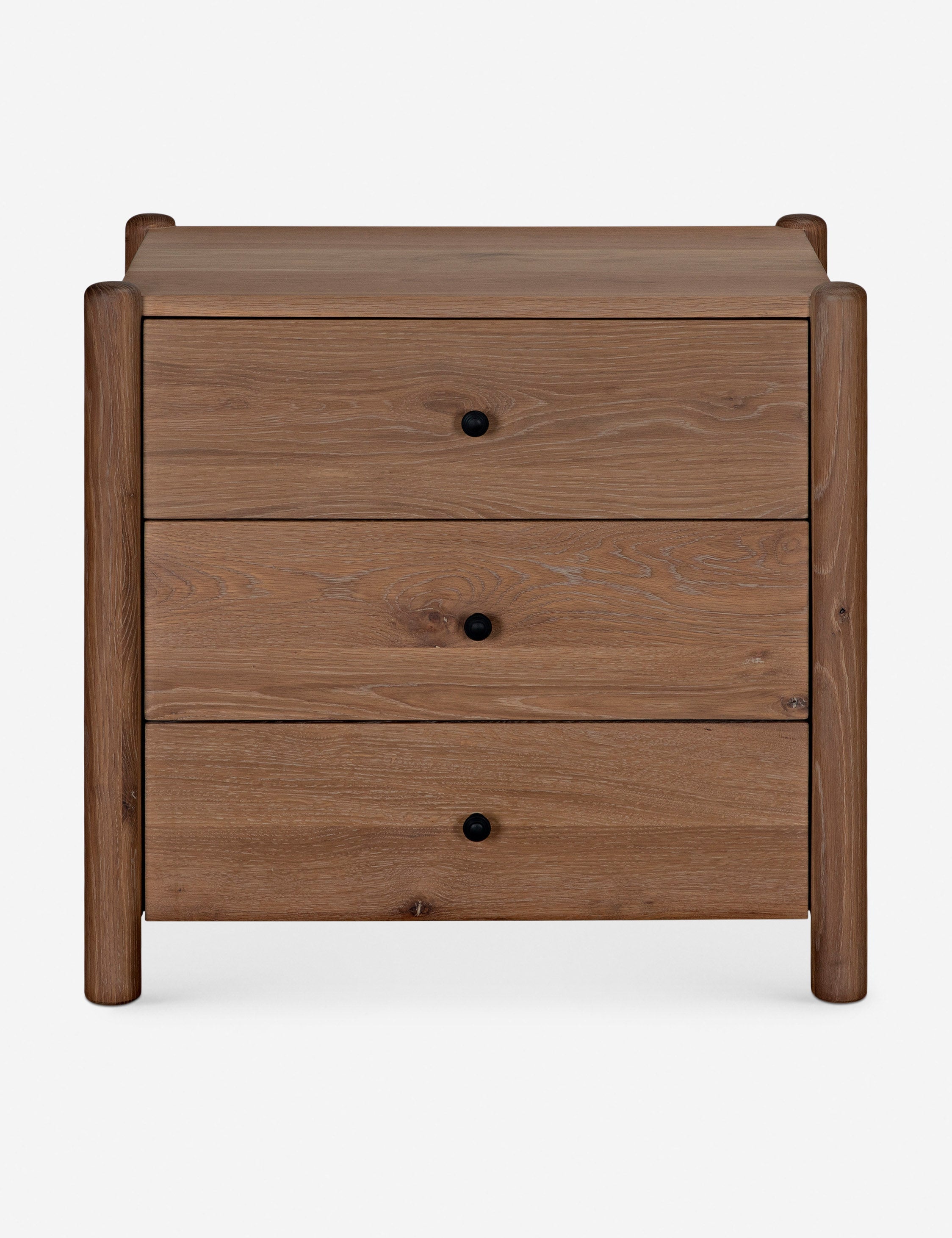 Table de chevet - Betham associe des pieds arrondis à un caisson aux lignes épurées pour un look à la fois sophistiqué et réfléchi.