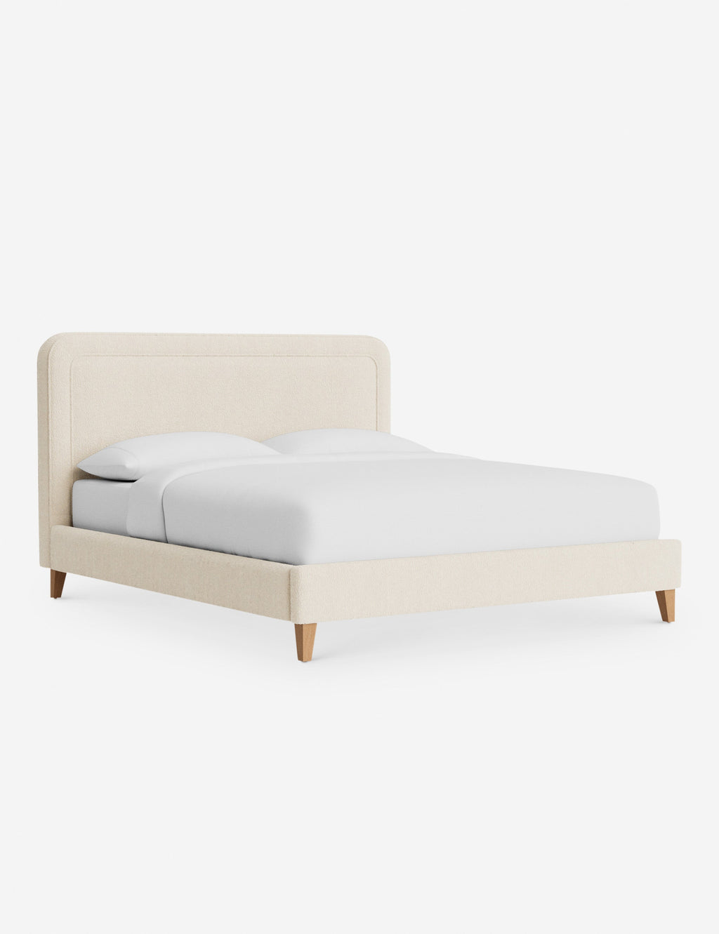 Lit - Avec ses lignes épurées et son cadre rembourré, le lit offre un look à la fois élégant et accueillant