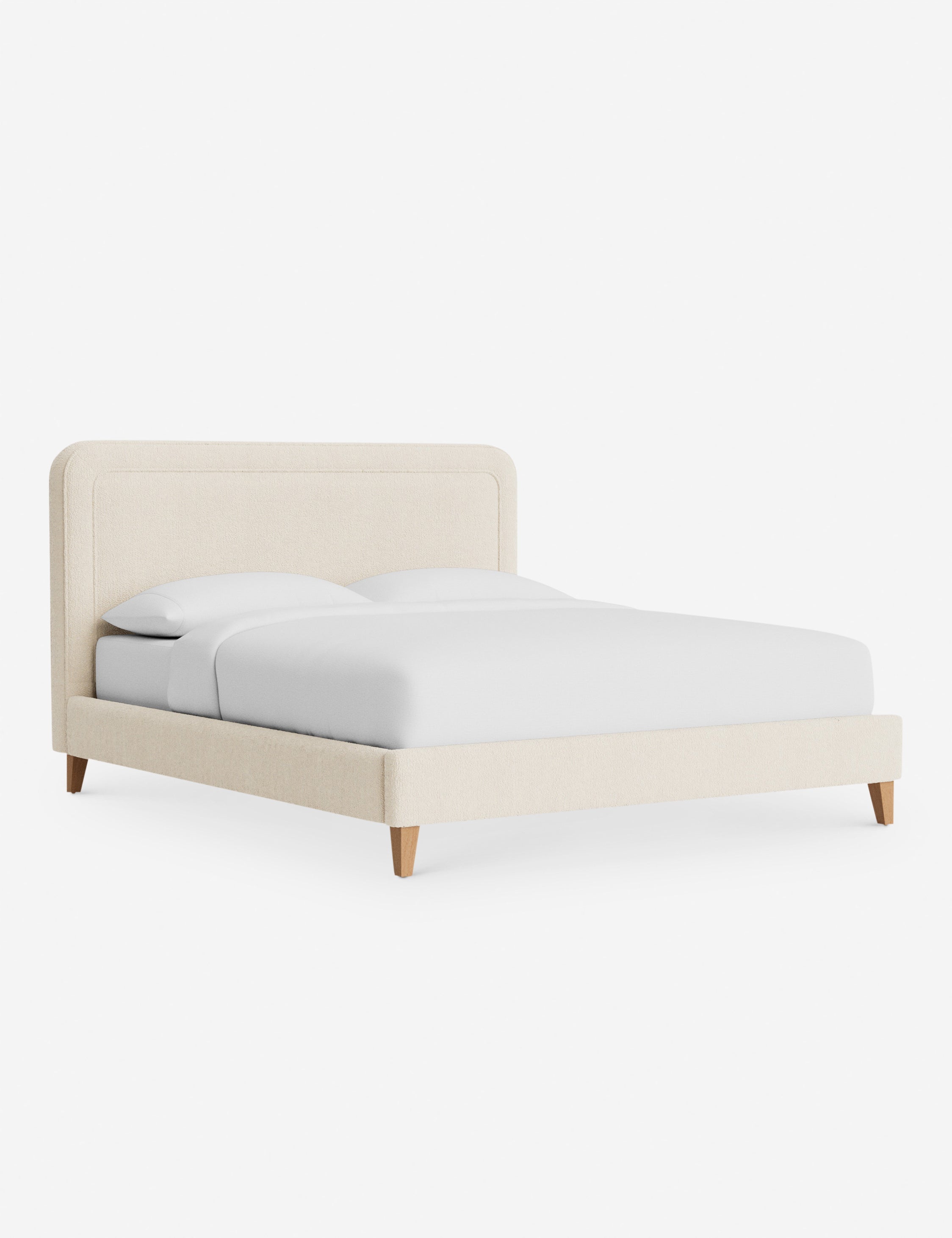 Lit - Avec ses lignes épurées et son cadre rembourré, le lit offre un look à la fois élégant et accueillant