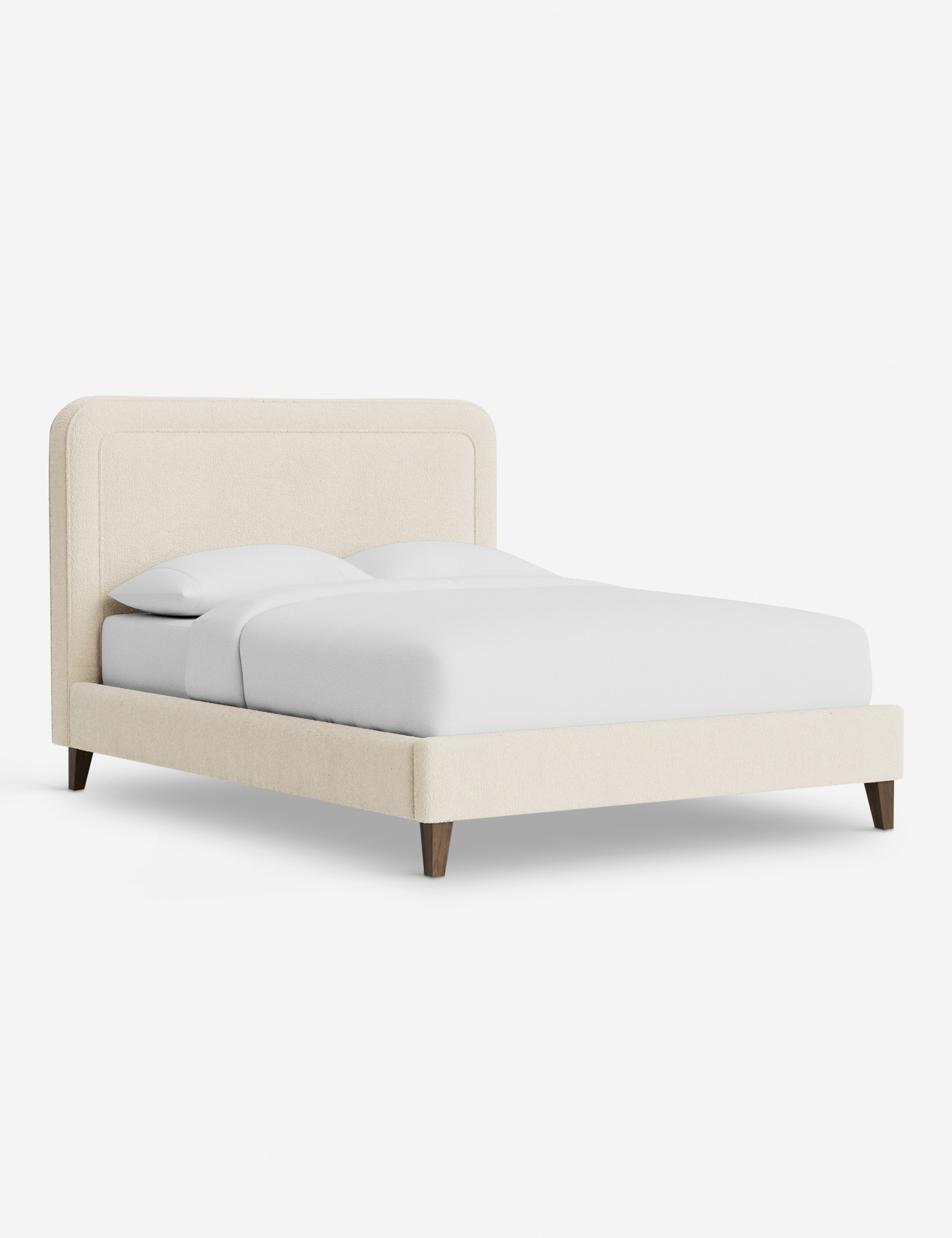 Lit - Avec ses lignes épurées et son cadre rembourré, le lit offre un look à la fois élégant et accueillant