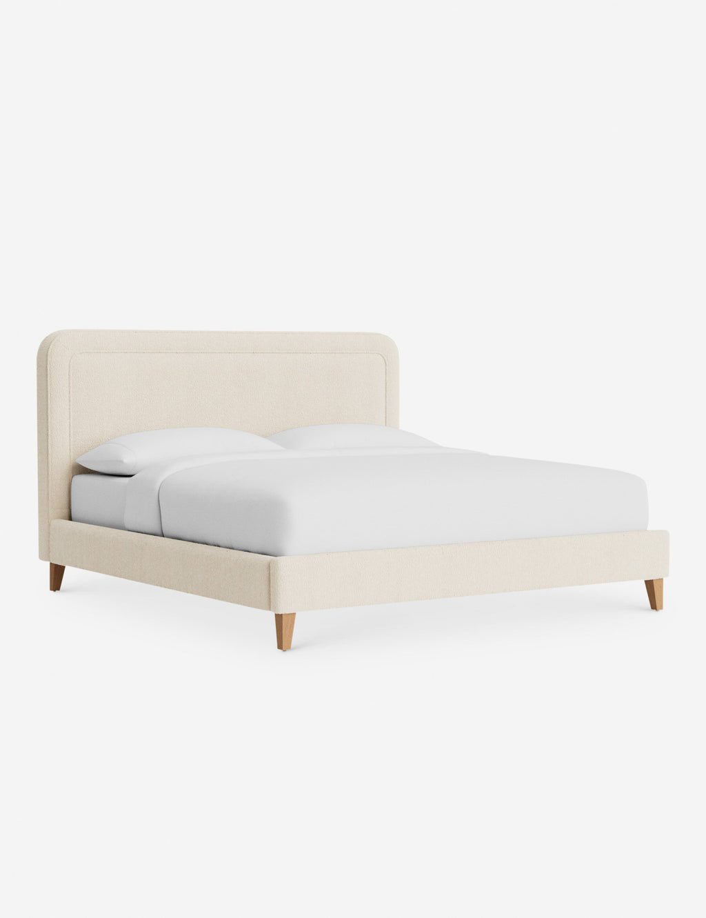 Lit - Avec ses lignes épurées et son cadre rembourré, le lit offre un look à la fois élégant et accueillant