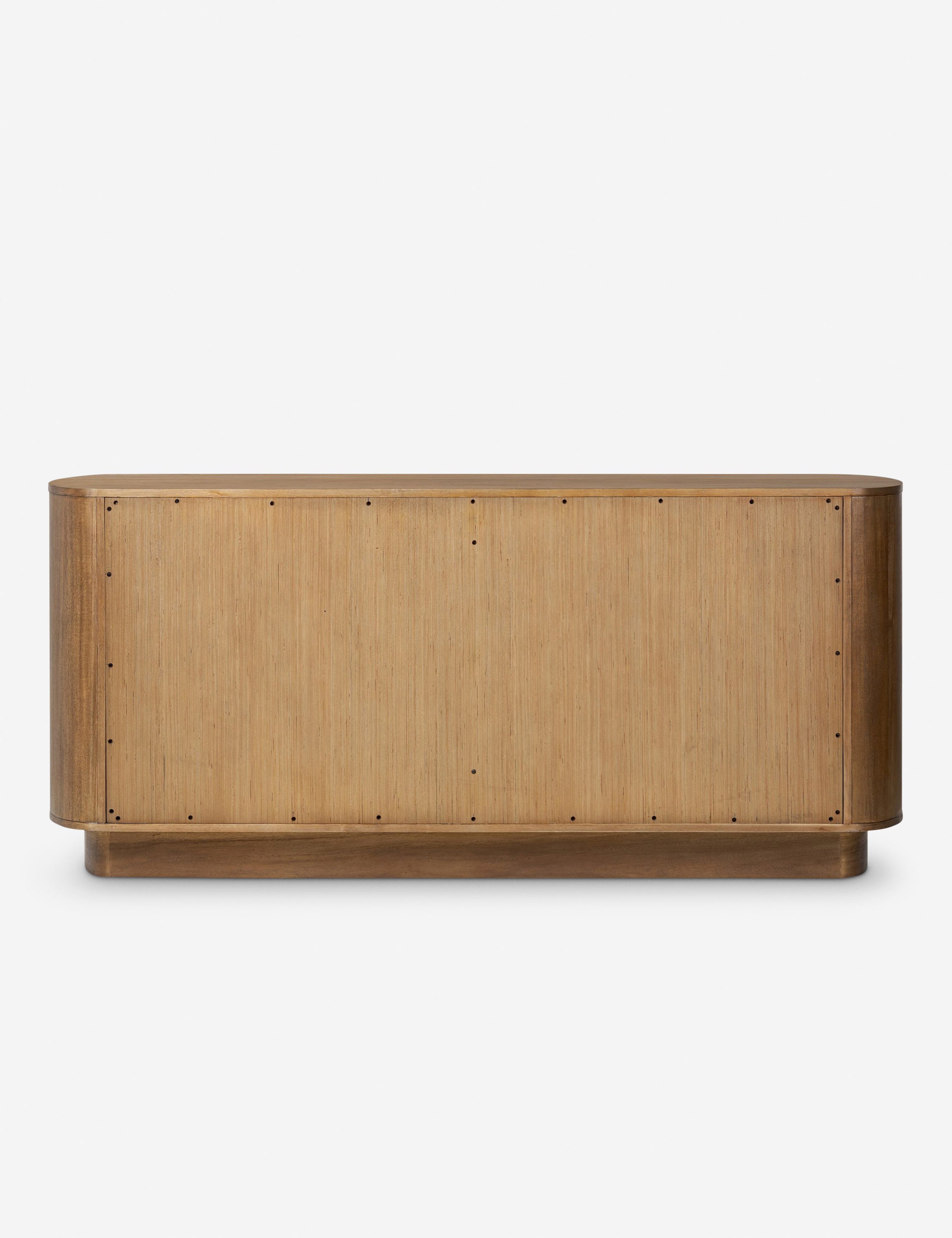 Commode - Les lignes douces de la commode se reflètent dans sa silhouette légèrement arrondie, offrant un design élégant avec un profil sculptural et raffiné.