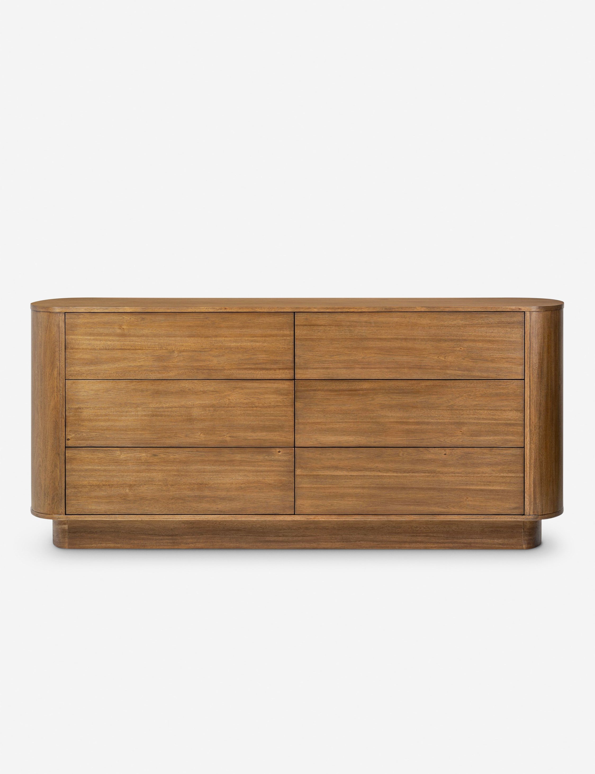 Commode - Les lignes douces de la commode se reflètent dans sa silhouette légèrement arrondie, offrant un design élégant avec un profil sculptural et raffiné.