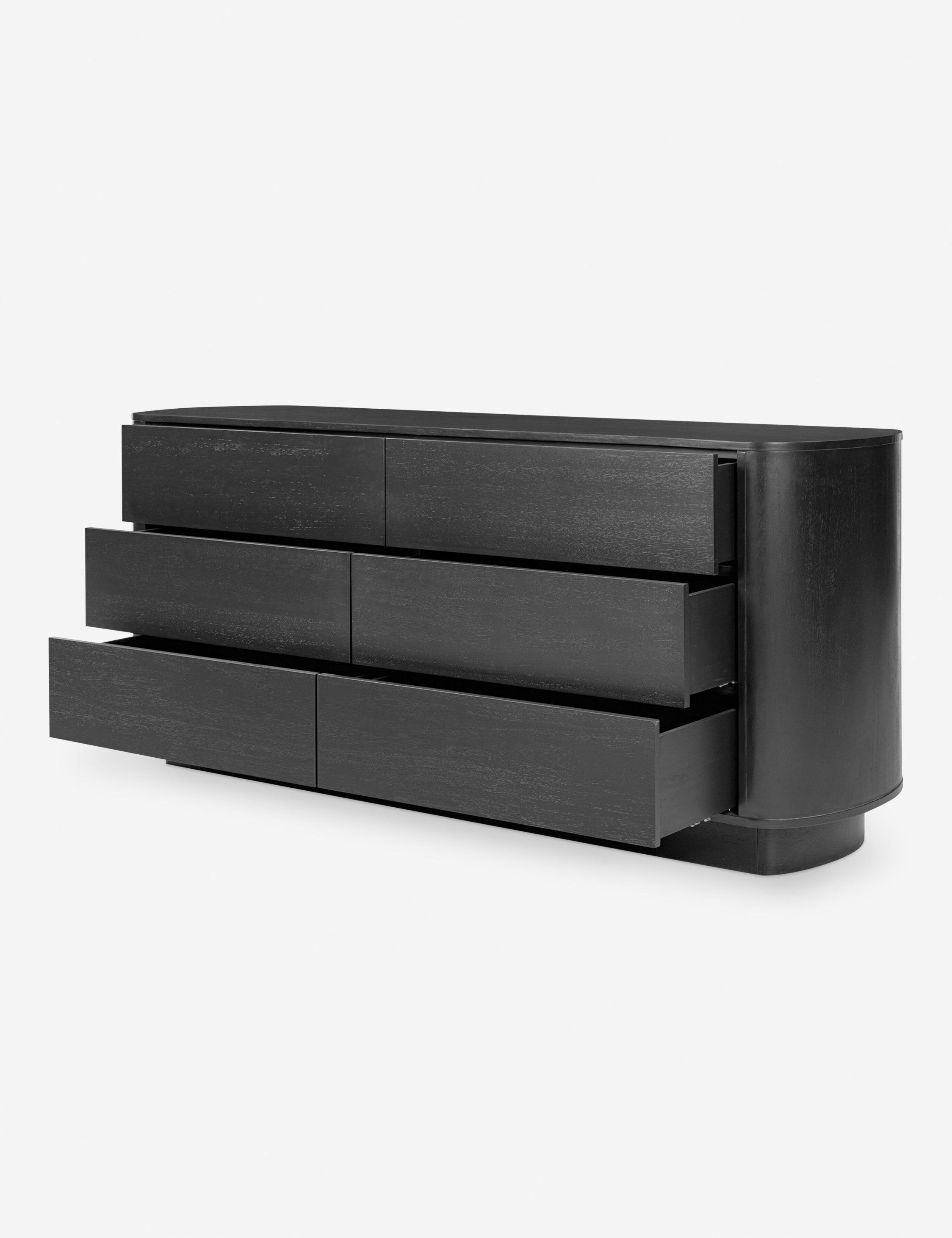 Commode - Les lignes douces de la commode se reflètent dans sa silhouette légèrement arrondie, offrant un design élégant avec un profil sculptural et raffiné.