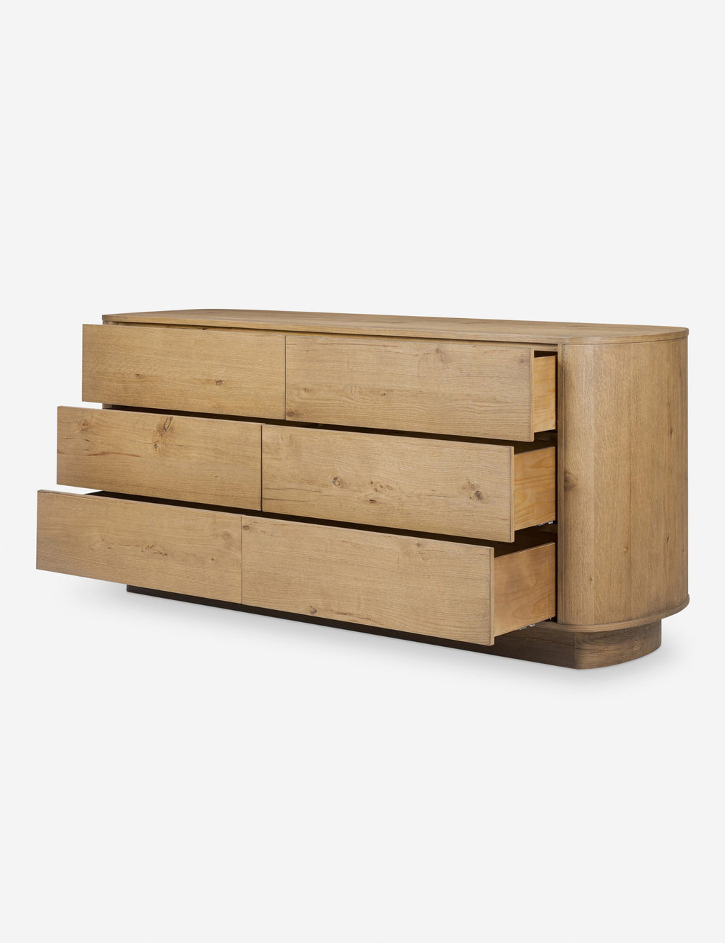 Commode - Les lignes douces de la commode se reflètent dans sa silhouette légèrement arrondie, offrant un design élégant avec un profil sculptural et raffiné.