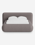 Lit plateforme arrondi - Notre lit se démarque par sa forme, avec une silhouette sculpturale qui vous invite à vous y lover