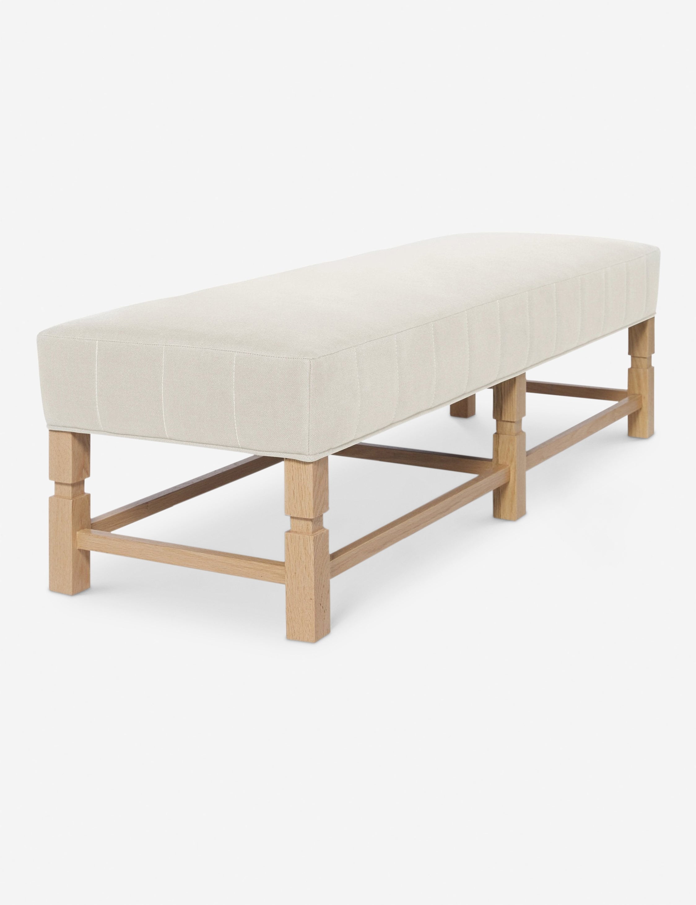 Banc – Alliant un style sur mesure à des matériaux classiques, ce banc rembourré est l'incarnation du confort intemporel.