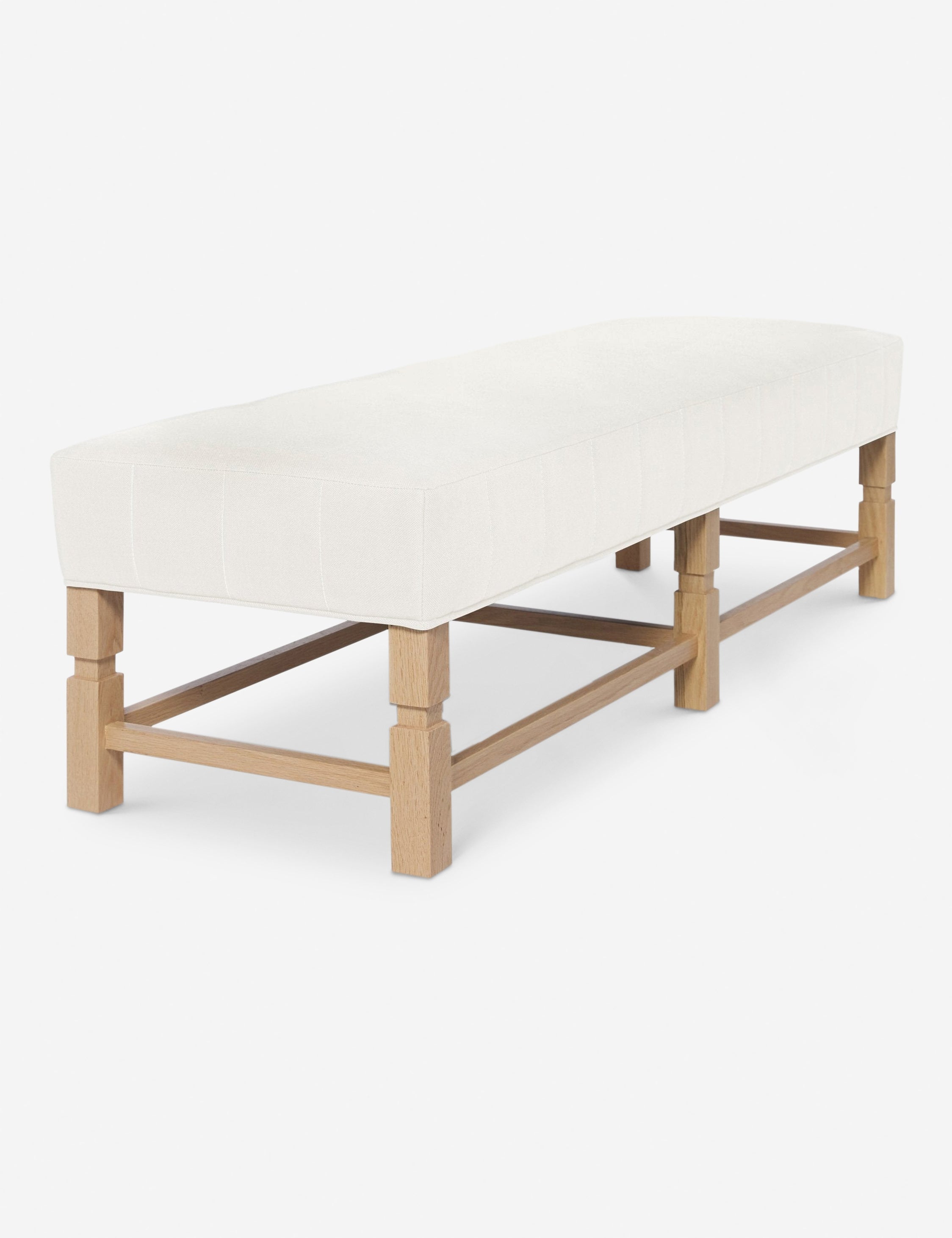 Banc – Alliant un style sur mesure à des matériaux classiques, ce banc rembourré est l'incarnation du confort intemporel.